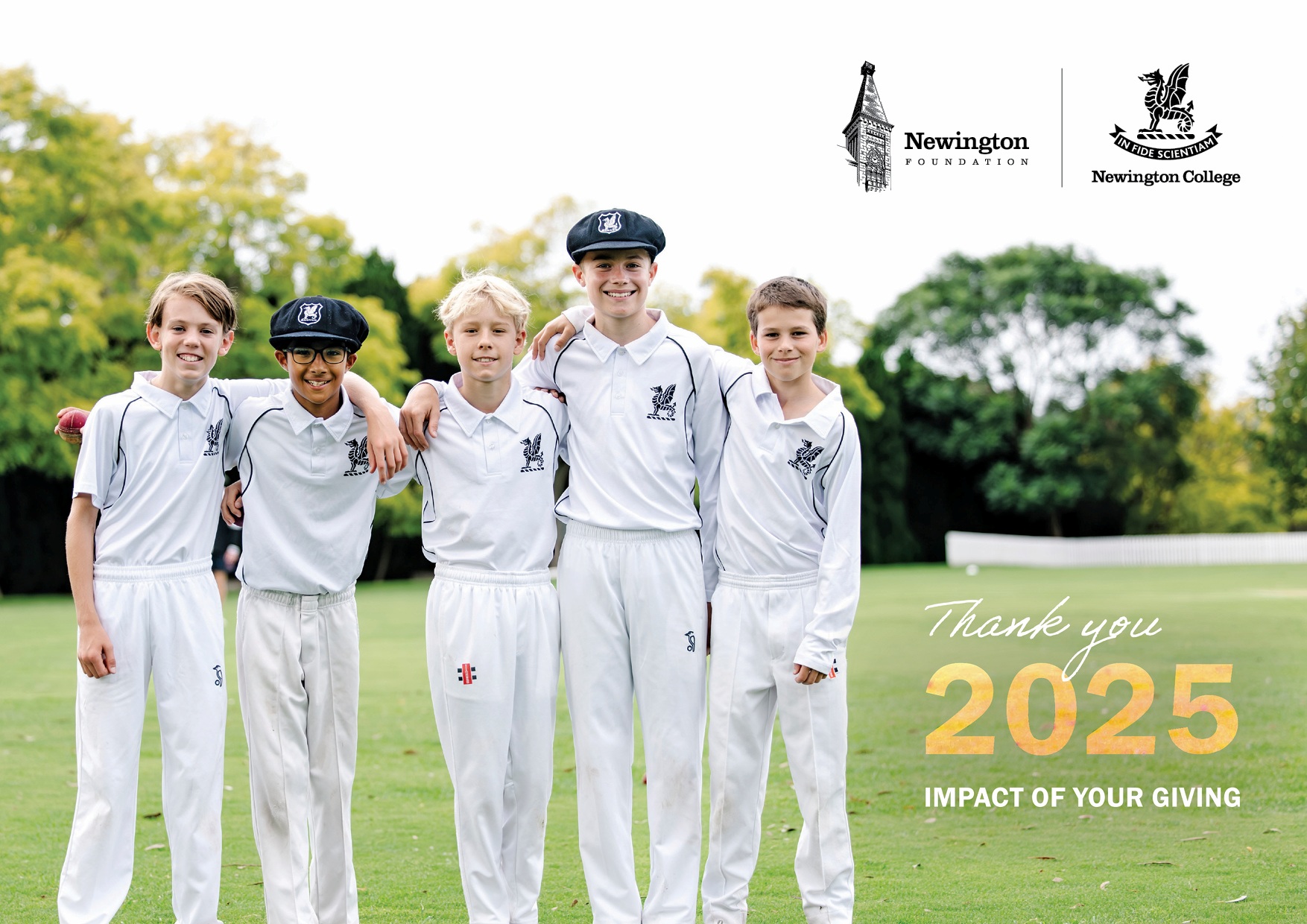 Group of teenage boys in cricket uniform